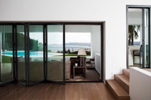 aluminium bi-fold doors leading onto balcony
