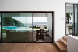 interior black aluminium sliding doors on modern balcony