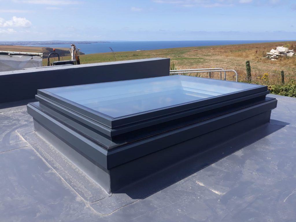 flat rooflight on house in countryside