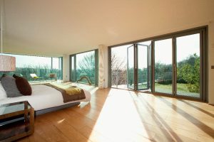 large bi-fold doors in bedroom