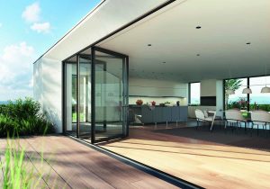 Open black aluminium bi-folding doors for modern home